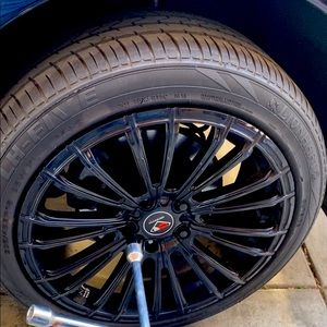4 wheels black rims good condition